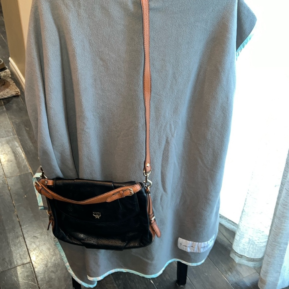 MCM Black bag with brown straps, one short and one long strap